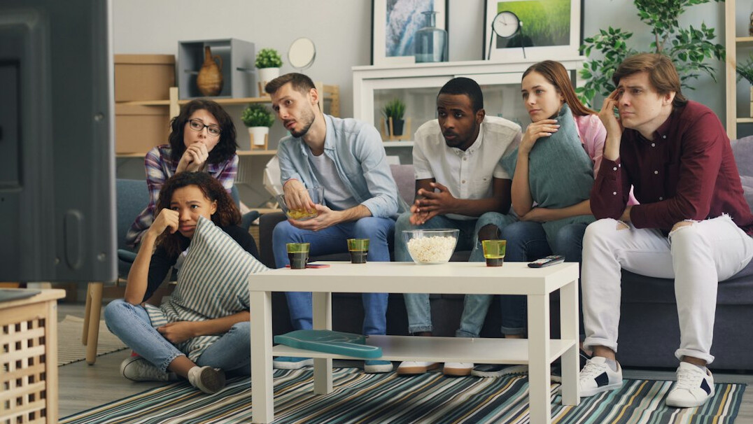 people watching tv together